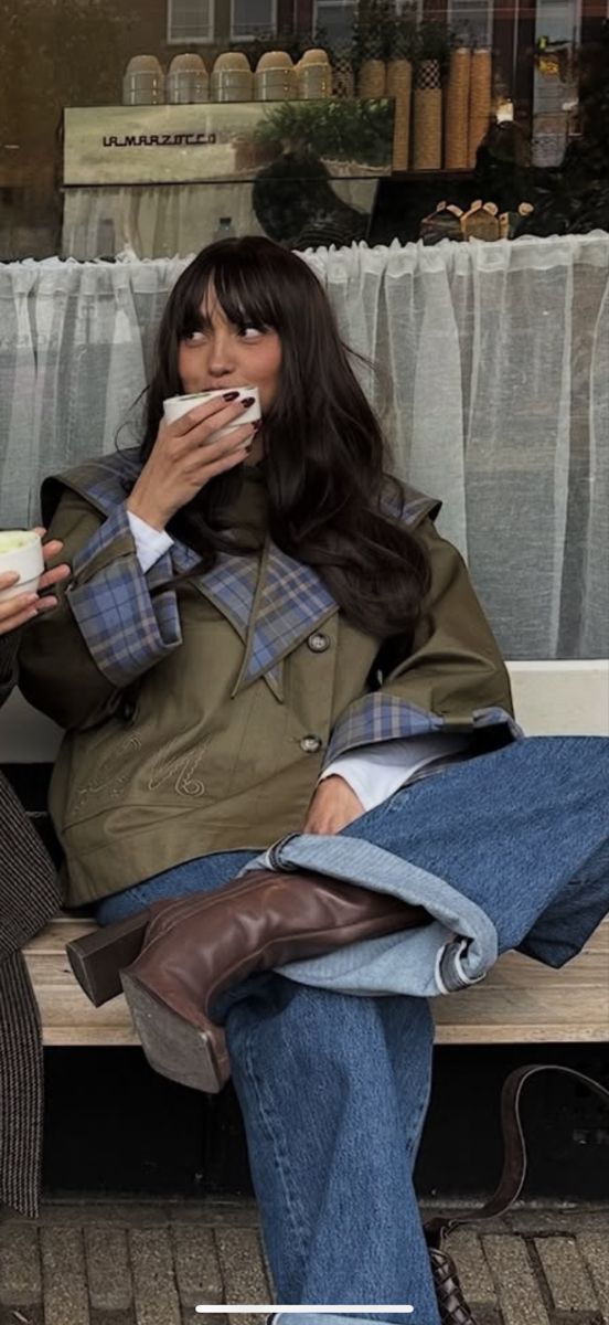 Chelsea with a mug of coffee